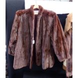 A LADIES SHORT FUR COAT, by 'The National Fur Company Ltd'
