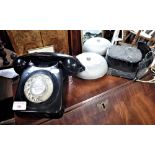 A VINTAGE BLACK DIAL TELEPHONE and an alarm bell