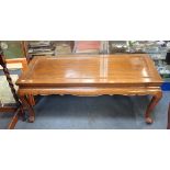 A CHINESE HARDWOOD LOW TABLE of traditional form with panelled top, 104cms wide