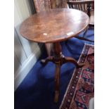 A GEORGE III OAK TRIPOD TABLE, 18th century and later elements, with circular top and baluster stem,