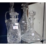 A SHIP'S DECANTER, a large Regency style cut glass decanter and two others