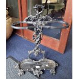 A CAST IRON STICK STAND with grape vine decoration