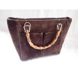 A GUCCI STYLE BROWN SUEDE HANDBAG with bamboo handles