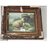 A NAIVE 19TH CENTURY STYLE OIL ON CANVAS PAINTING OF SHEEP AND A LAMB IN A ROCKY LANDASCAPE