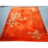 LARGE CHINESE STYLE MACHINE WOVEN WOOL CARPET, with flowers and foliage shown naturalistically on a