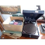 AN 'HIS MASTER'S VOICE' MODEL 102C PORTABLE GRAMOPHONE and a collection of 78's