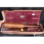 A 'DAVON' PATENT TELESCOPE with extra lenses in original (distressed) fitted leather case