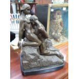 A BRONZE STUDY OF A NUDE COUPLE on a polished black marble base, 36cm high (overall)