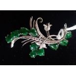 ITEM 1 A "JADEITE" BROOCH, set on white gold, stamped "14K"