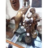 A CONTEMPORARY POLISHED BRONZE STUDY OF TWO DOLPHINS and two cast metal studies of period figures (3