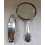 A SILVER COVERED DRESSING TABLE MIRROR AND BRUSH