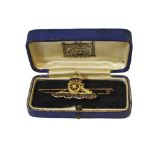 9CT GOLD ROYAL ARTILLERY PIN marked '9c'. Contained in velvet lined case.