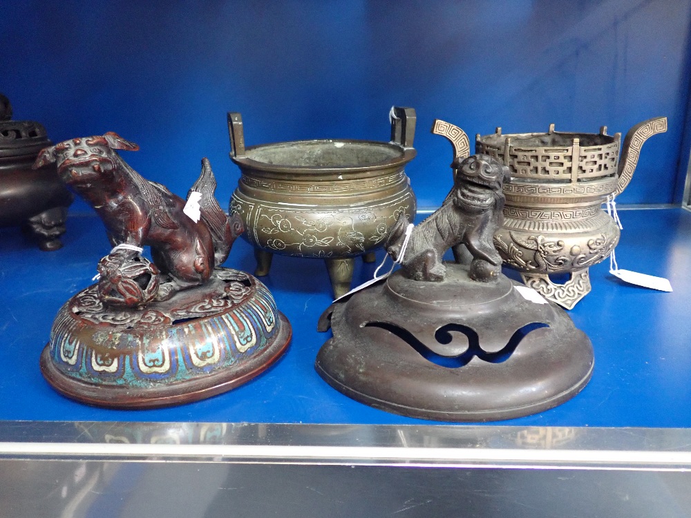 A CHINESE BRONZE CENSER, another similar and two spare censer lids (4)