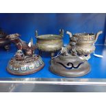 A CHINESE BRONZE CENSER, another similar and two spare censer lids (4)