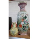 A LARGE CANTONESE FAMILE ROSE PORCELAIN BALUSTER VASE, 60CM HIGH; AND A SMALLER ORIENTAL VASE