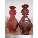 A PAIR OF CHINESE RED LACQUER STYLE HEXAGONAL SECTION BALUSTER VASES, 36CM HIGH