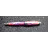 A WATERMAN FOUNTAIN PEN with purple marbled body
