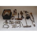 A COLLECTION OF WINE LABELS, CORKSCREWS AND STOPPERS, mostly silver-plated