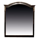 VICTORIAN PARCEL GILT, EBONISED AND GILT METAL MOUNTED OVERMANTEL MIRROR, circa 1880, with arched eg