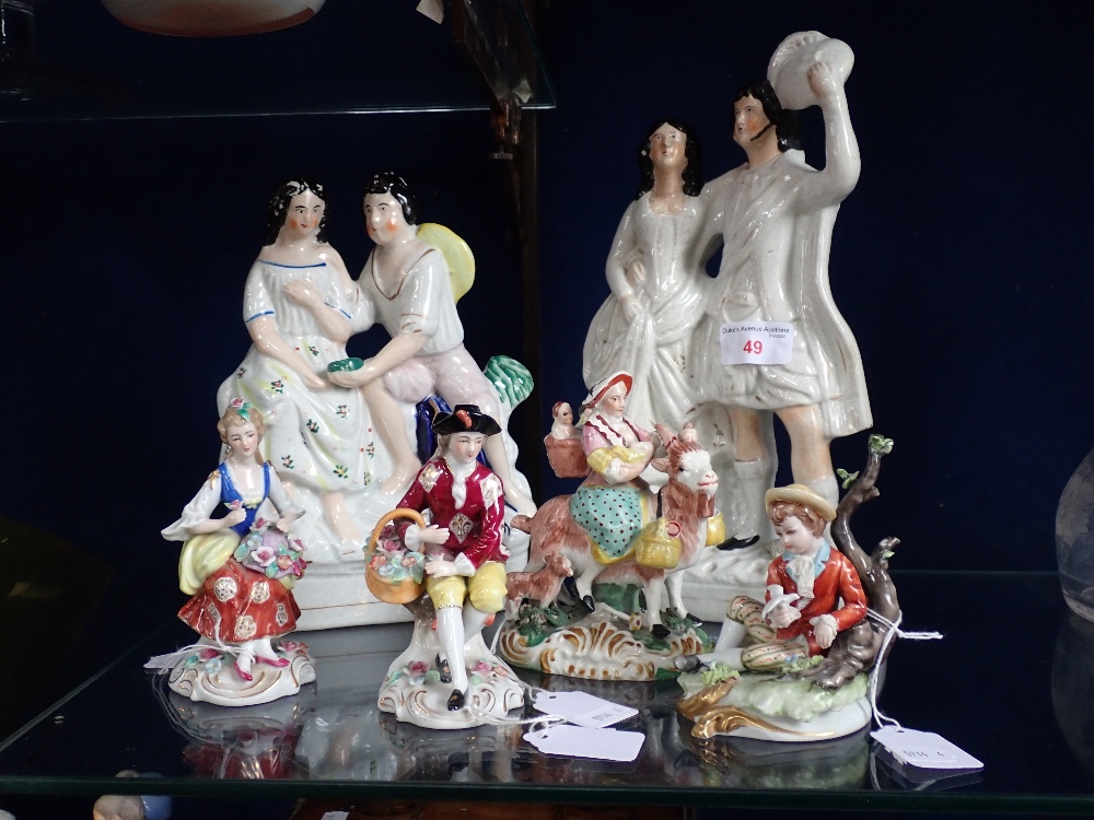 A 19TH CENTURY STAFFORDSHIRE FIGURE OF THE 'WELCH TAYLOR'S WIFE', two larger Staffordshire figures a