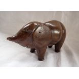 A FOLK ART TREEN ELEPHANT, OF GREAT CHARACTER, WITH GLASS EYES, and truncated trunk