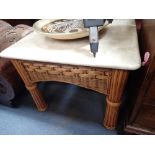 A COLONIAL STYLE RATTAN COFFEE TABLE with faux ivory top, 70cm square