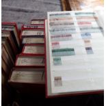 A LARGE COLLECTION OF STAMPS CONTAINED IN STOCK ALBUMS, British Commonwealth, Switzerland and Mongol