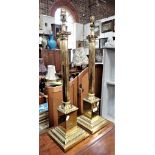 A PAIR OF BRASS CORINTHIAN COLUMN TABLE LAMPS, 59cm high (plus fittings)