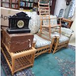 A PALE BEECH SHAKER STYLE LADDER BACK ROCKING CHAIR with rush seat, and a pair of conservatory armch