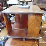 AN EDWARDIAN MAHOGANY TABLE TOP REVOLVING BOOKCASE