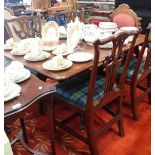 A REGENCY MAHOGANY BREAKFAST TABLE on down swept legs, 137cms long