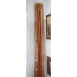 THREE PINE CURTAIN POLES, approx 240cm long with rings and brackets and another pair approximately 2