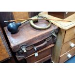 A VINTAGE LEATHER SUITCASE, a brass motor car horn and a swagger stick 'The East Surrey Regiment'