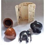 A 19TH CENTURY CHINESE PIERCED IVORY PHOTOGRAPH FRAME, polished nut case and two carved elephants