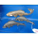 A PAIR OF ORIENTAL BRONZE CARP and another similar (3)