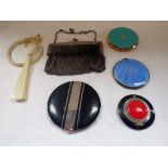A SILVER MESH EVENING PURSE, together with a collection of vintage compacts and a fan