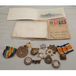 A COLLECTION OF MILITARY BADGES, WARTIME CARDS, A CALENDAR and other items