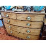 A 19TH CENTURY MAHOGANY BOW FRONTED CHEST OF DRAWERS with brass drop handles, 107cm wide