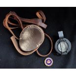 A BRASS-CASED MILITARY COMPASS WITH LEATHER CARRYING CASE