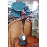 AFTER M. PELLIER, a reproduction Art Deco bronze figure of a dancing peacock girl, 55cms high