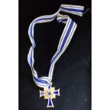 A NAZI STYLE 'MOTHER'S CROSS' MEDAL ON RIBBON