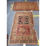 A SMALL PERSIAN RUG/HANGING 110cm x 70cm (tapering to 65cm) and a prayer rug 65cm x 110cm (both worn