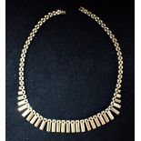 A YELLOW GOLD FRINGE NECKLACE, stamped "375", approx 18.4grams