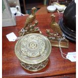 A PAIR OF BRASS PHEASANT CHIMNEY ORNAMENTS and an embossed brass circular box