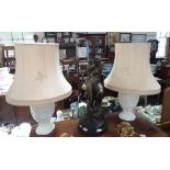 A PAIR OF CAST COMPOSITION TABLE LAMPS, of baluster form with Chinese scenes and motifs all over, wi