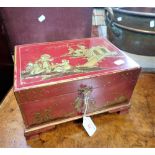 A RED LACQUER CHINOISERIE DECORATED JEWELLERY BOX, 26cms wide