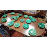 A COLLECTION OF 19TH CENTURY GREEN GLAZED LEAF PLATES and similarly ceramics