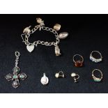 A COLLECTION OF COSTUME JEWELLERY, to include a silver charm bracelet