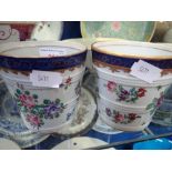 A PAIR OF CONTINENTAL FLOWER POTS with floral decoration, 9cm high