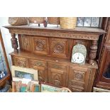 A LARGE REPRODUCTION FRENCH OAK COURT CUPBOARD